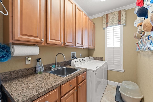 600 Egret Place Dr, Winter Garden, FL 34787 - washroom with washer and dryer, cabinet space, crown molding, baseboards, and light tile patterned floors