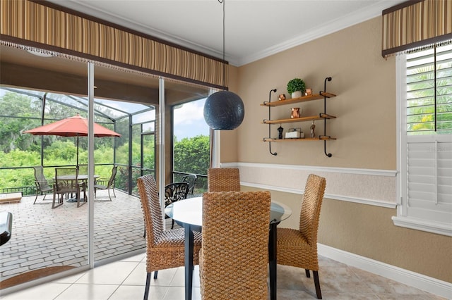 600 Egret Place Dr, Winter Garden, FL 34787 - dining space featuring ornamental molding, light tile patterned floors, a sunroom, and baseboards