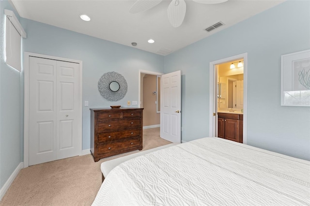 600 Egret Place Dr, Winter Garden, FL 34787 - bedroom featuring light carpet, a closet, baseboards, ceiling fan, and connected bathroom