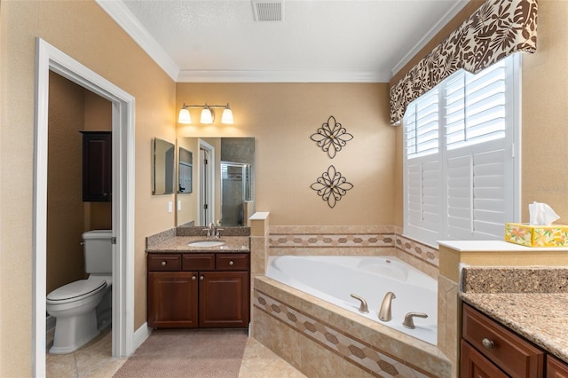 600 Egret Place Dr, Winter Garden, FL 34787 - full bathroom featuring toilet, a garden tub, vanity, ornamental molding, and tile patterned flooring