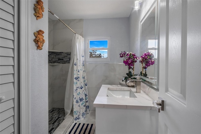 40140 Swift Rd, Eustis, FL 32736 - bathroom featuring vanity, a stall shower, and tile walls