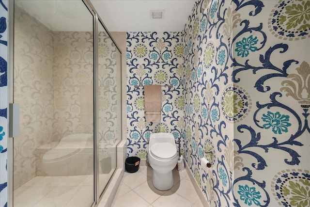 241 Riverside Dr Unit 902, Holly Hill, FL 32117 - bathroom featuring a stall shower and tile patterned flooring