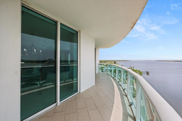 241 Riverside Dr Unit 902, Holly Hill, FL 32117 - balcony featuring a water view