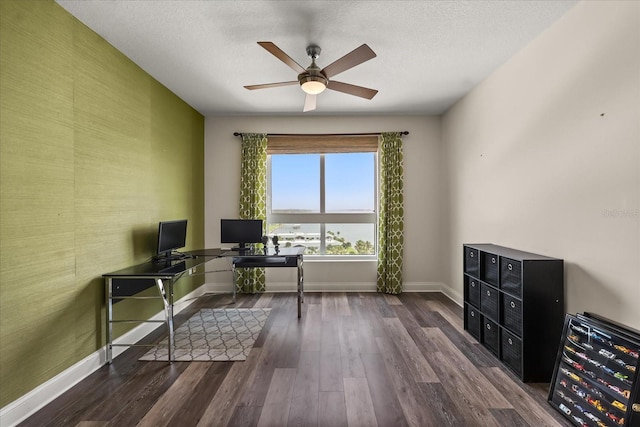 241 Riverside Dr Unit 902, Holly Hill, FL 32117 - office area featuring ceiling fan, wood finished floors, an accent wall, and a textured ceiling