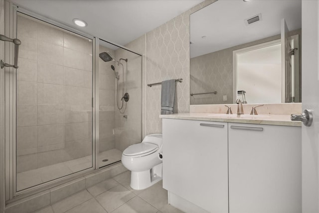241 Riverside Dr Unit 902, Holly Hill, FL 32117 - full bathroom with tile patterned floors, a shower stall, vanity, and wallpapered walls