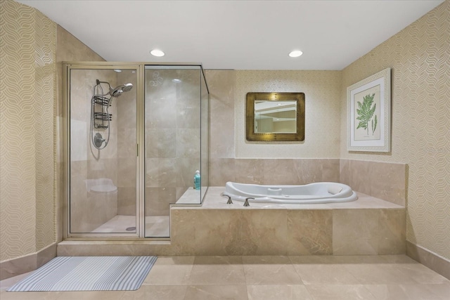 241 Riverside Dr Unit 902, Holly Hill, FL 32117 - full bathroom with wallpapered walls, a bath, a stall shower, and recessed lighting