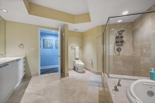 241 Riverside Dr Unit 902, Holly Hill, FL 32117 - bathroom featuring vanity, a stall shower, a garden tub, and recessed lighting
