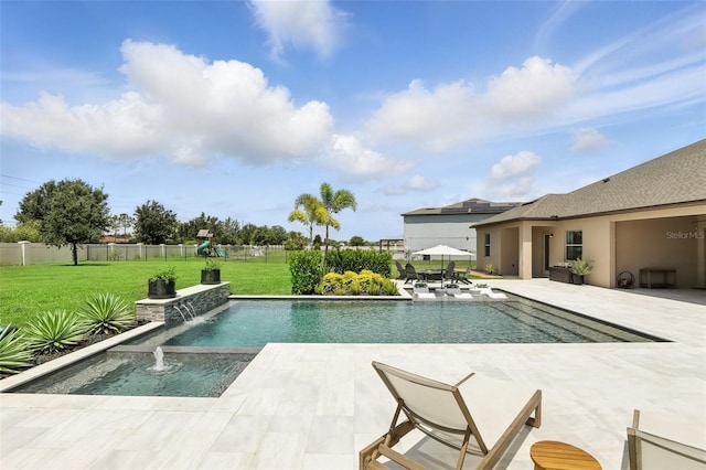 2118 Whiting Trl, Orlando, FL 32820 - view of swimming pool with a patio, a playground, and a pool with connected hot tub