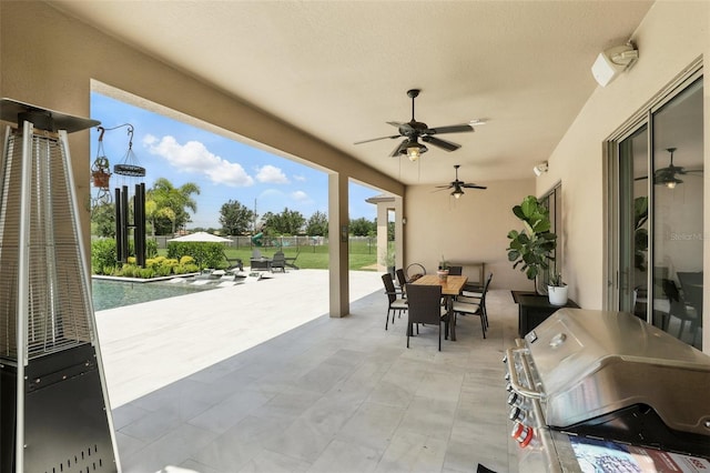 2118 Whiting Trl, Orlando, FL 32820 - view of patio with outdoor dining space, ceiling fan, grilling area, and a pool