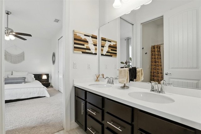 2118 Whiting Trl, Orlando, FL 32820 - ensuite bathroom featuring double vanity and ceiling fan