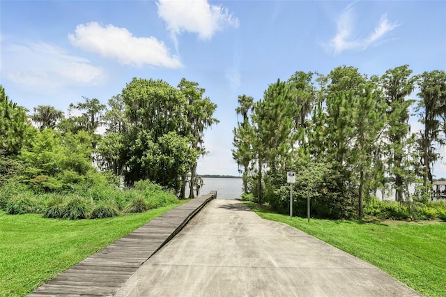 2118 Whiting Trl, Orlando, FL 32820 - view of community with a lawn and a water view