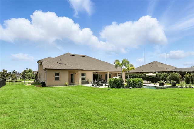 2118 Whiting Trl, Orlando, FL 32820 - rear view of house featuring a patio, a shingled roof, stucco siding, and a ceiling fan