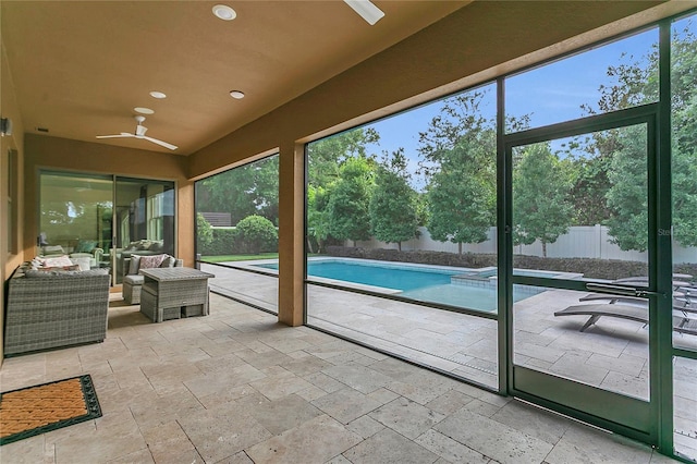 1938 Filly Trl, Oviedo, FL 32765 - fenced backyard featuring a ceiling fan, outdoor lounge area, a patio, and a pool with connected hot tub