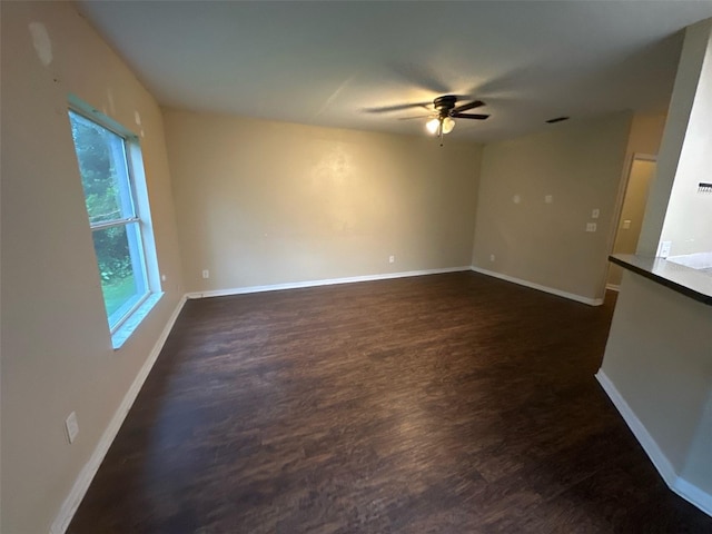 3805 N Cranberry Blvd, North Port, FL 34286 - unfurnished room featuring a ceiling fan and dark wood finished floors