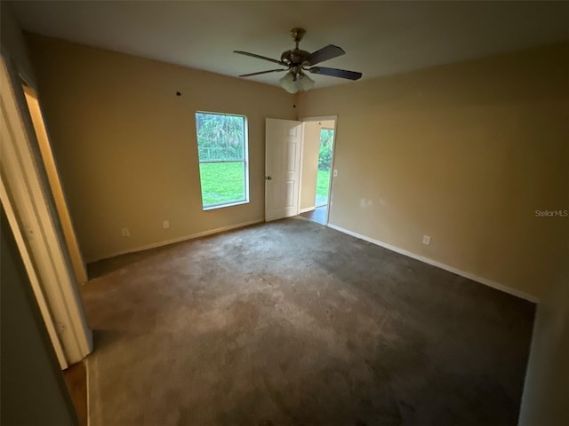 3805 N Cranberry Blvd, North Port, FL 34286 - unfurnished room with ceiling fan and dark carpet