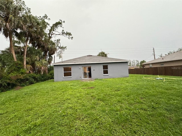 3805 N Cranberry Blvd, North Port, FL 34286 - back of house with stucco siding