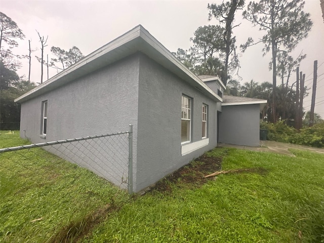 3805 N Cranberry Blvd, North Port, FL 34286 - view of side of property with stucco siding