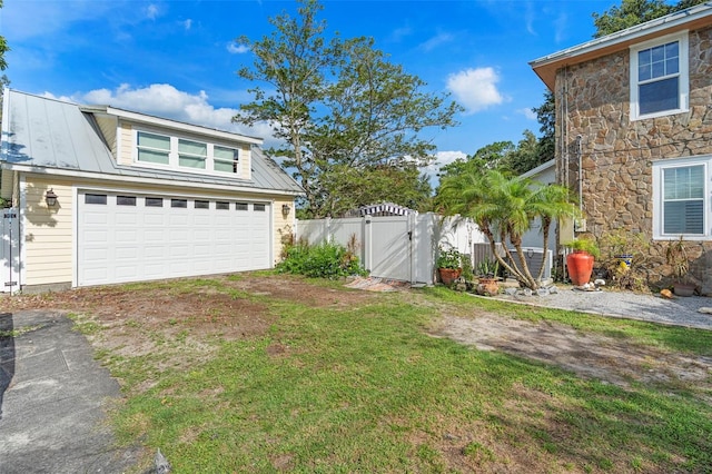 6501 Matchett Rd, Belle Isle, FL 32809 - view of yard featuring a gate, a garage, and driveway