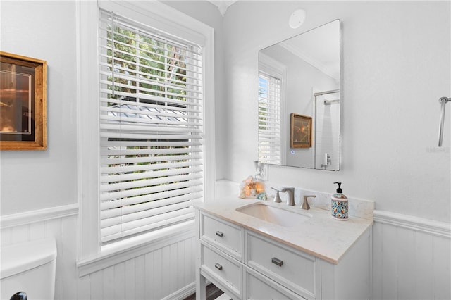 6501 Matchett Rd, Belle Isle, FL 32809 - full bath with wainscoting, vanity, ornamental molding, a shower, and a decorative wall