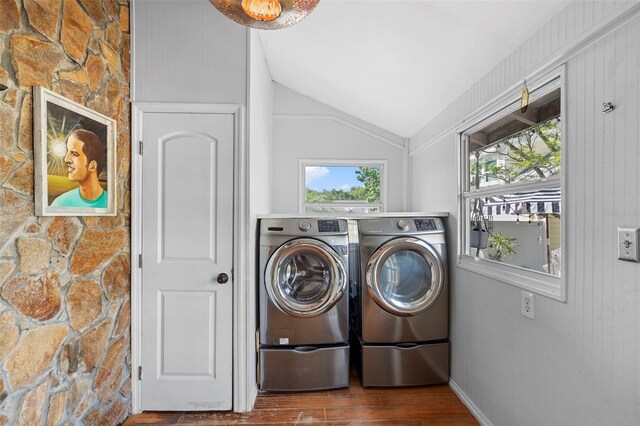 6501 Matchett Rd, Belle Isle, FL 32809 - washroom featuring washing machine and clothes dryer and wood finished floors