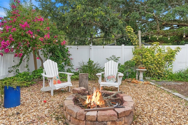 6501 Matchett Rd, Belle Isle, FL 32809 - fenced backyard with an outdoor fire pit