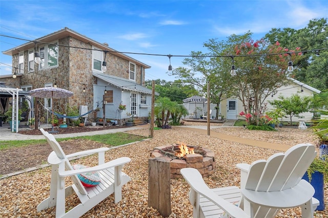 6501 Matchett Rd, Belle Isle, FL 32809 - view of yard with an outdoor fire pit
