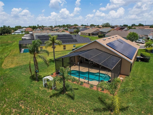 456 Old Bridge Cir, Davenport, FL 33897 - outdoor pool featuring a residential view, a patio area, a yard, and glass enclosure