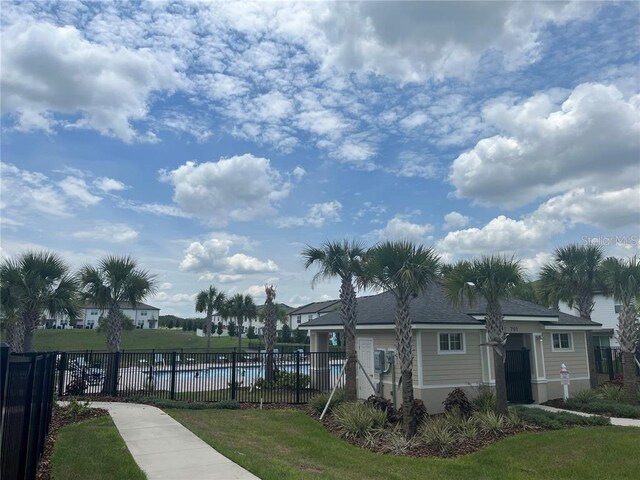 497 Madison Dr, Davenport, FL 33837 - view of community with a swimming pool