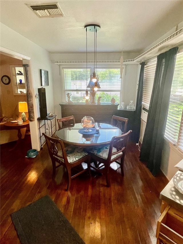 578 3rd St, Daytona Beach, FL 32117 - dining area with hardwood / wood-style floors and plenty of natural light
