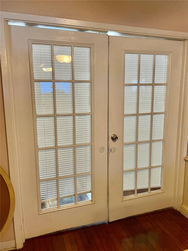 578 3rd St, Daytona Beach, FL 32117 - doorway to outside with dark wood-style floors