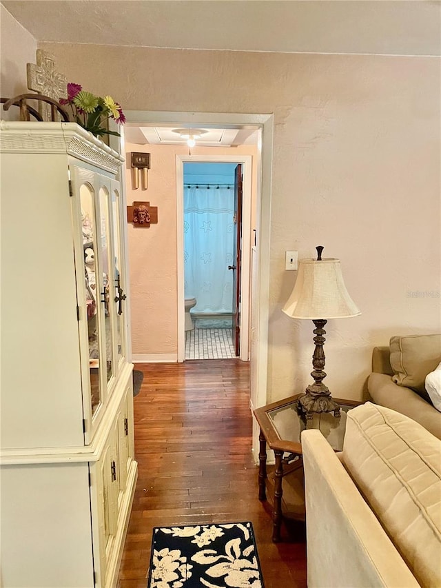 578 3rd St, Daytona Beach, FL 32117 - hall featuring dark wood-style flooring and attic access