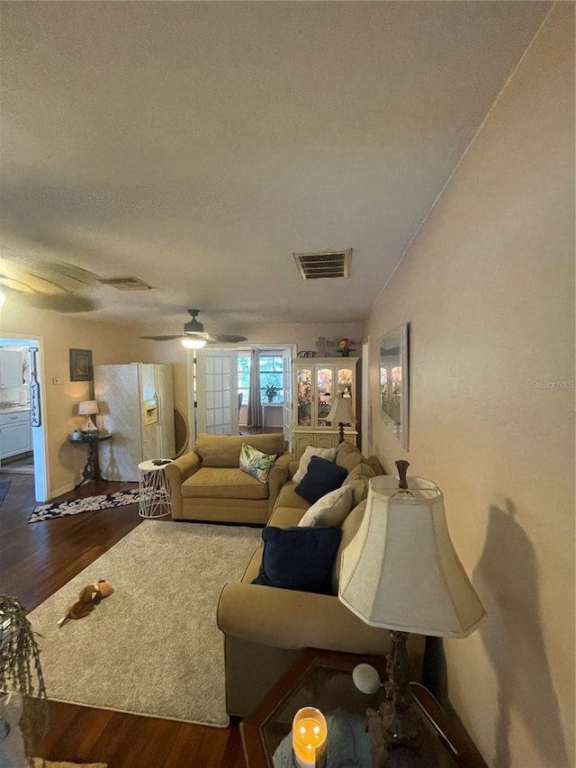 578 3rd St, Daytona Beach, FL 32117 - living room with dark wood-style flooring and a ceiling fan