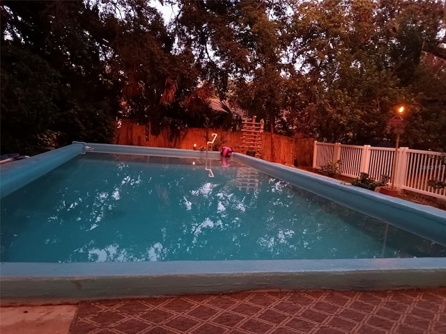 578 3rd St, Daytona Beach, FL 32117 - view of pool with a fenced backyard