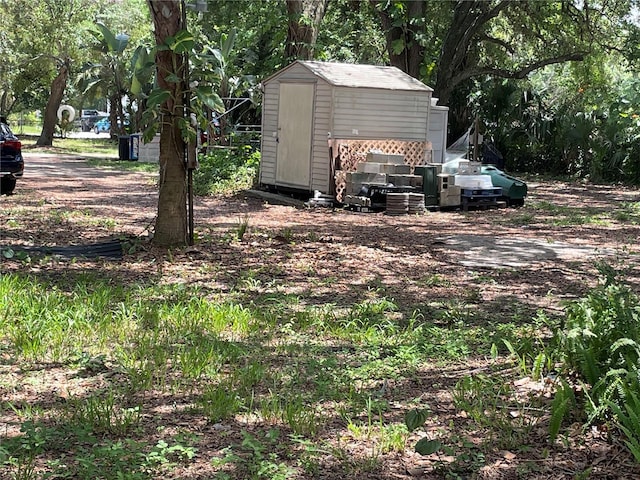 578 3rd St, Daytona Beach, FL 32117 - view of yard with a shed
