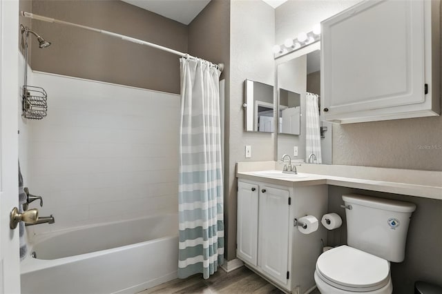 1125 Lake Shadow Cir Unit 5109, Maitland, FL 32751 - full bathroom with wood finished floors, shower / bathtub combination with curtain, a textured wall, and vanity