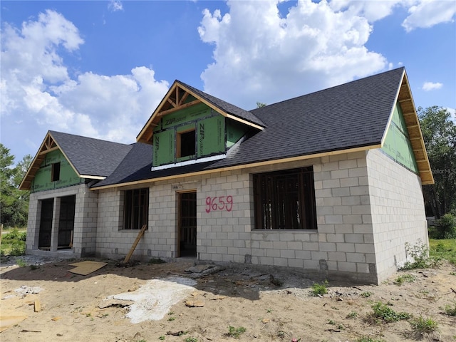 9659 Midway Rd, Haines City, FL 33844 - property under construction with roof with shingles and concrete block siding