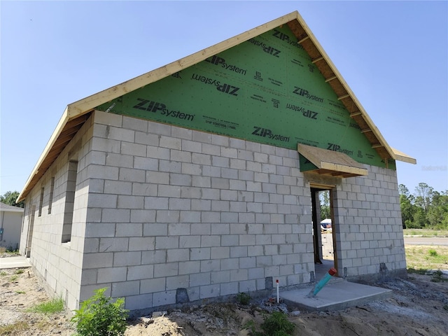 9659 Midway Rd, Haines City, FL 33844 - view of side of home with concrete block siding
