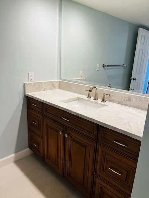 204 Quayside Cir Unit 601, Maitland, FL 32751 - bathroom with vanity and tile patterned floors