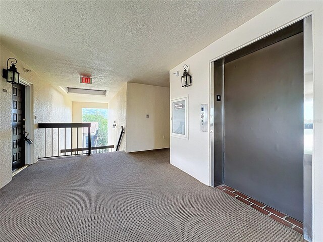 204 Quayside Cir Unit 601, Maitland, FL 32751 - hallway featuring an upstairs landing, elevator, and attic access