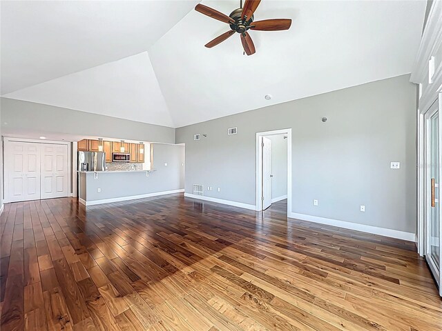 204 Quayside Cir Unit 601, Maitland, FL 32751 - unfurnished living room featuring high vaulted ceiling, ceiling fan, and hardwood / wood-style floors