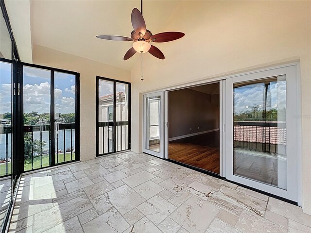204 Quayside Cir Unit 601, Maitland, FL 32751 - unfurnished sunroom featuring vaulted ceiling