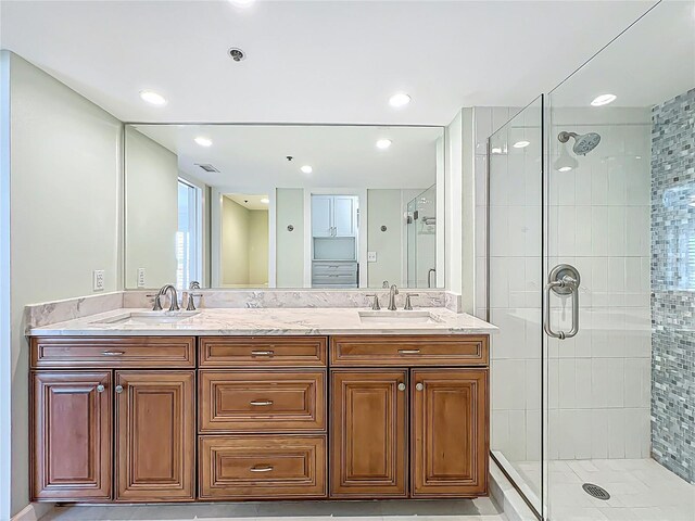 204 Quayside Cir Unit 601, Maitland, FL 32751 - full bathroom with a shower stall, double vanity, and tile patterned flooring