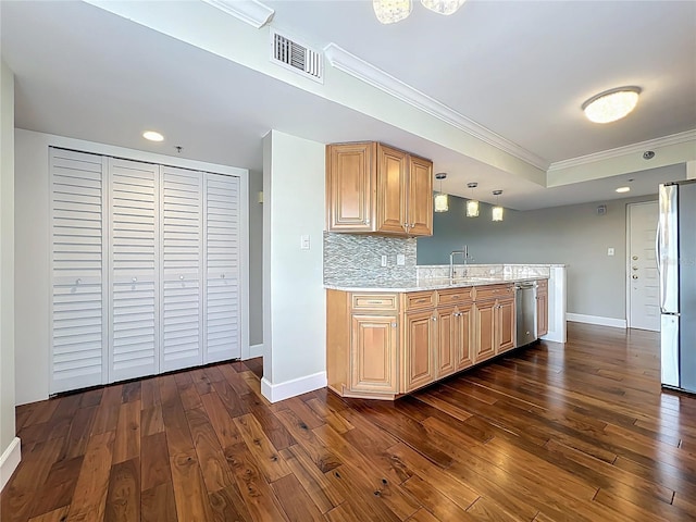 204 Quayside Cir Unit 601, Maitland, FL 32751 - kitchen featuring stainless steel appliances, crown molding, dark wood-type flooring, tasteful backsplash, and hanging light fixtures