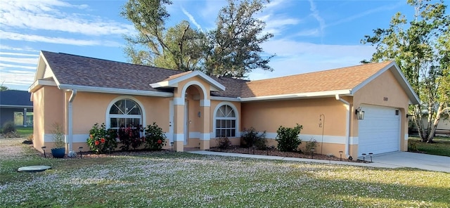 1835 Rival Ter, North Port, FL 34286 - ranch-style house with a garage, stucco siding, a front lawn, driveway, and roof with shingles