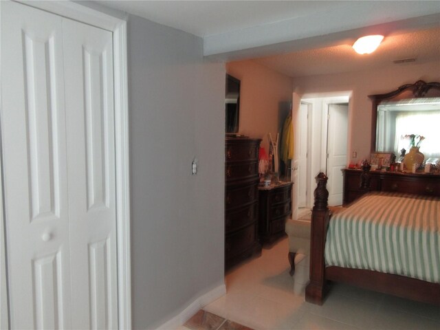 362 White Marsh Cir, Orlando, FL 32824 - bedroom with tile patterned flooring and baseboards