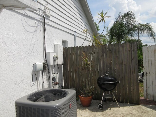 362 White Marsh Cir, Orlando, FL 32824 - exterior view of a cooling unit and stucco siding