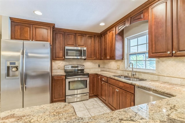 403 Broadview Ave, Altamonte Springs, FL 32701 - kitchen featuring stainless steel appliances, light stone counters, light tile patterned flooring, backsplash, and recessed lighting
