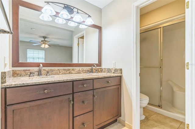 403 Broadview Ave, Altamonte Springs, FL 32701 - full bathroom with double vanity, a shower stall, tile patterned floors, and a ceiling fan