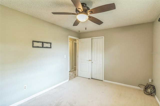 403 Broadview Ave, Altamonte Springs, FL 32701 - unfurnished bedroom featuring light carpet, a closet, and a ceiling fan
