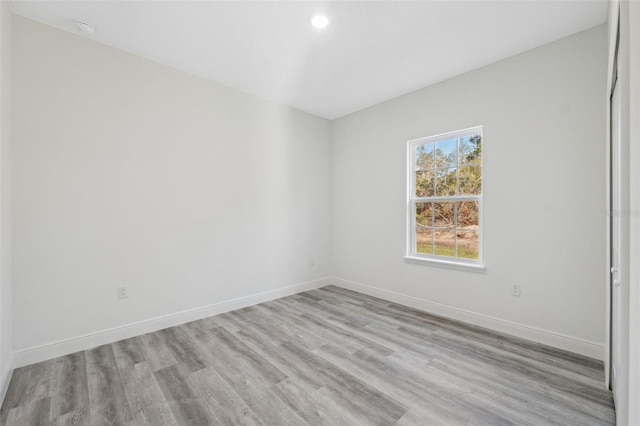 3159 SW 127th Lane Rd, Ocala, FL 34473 - unfurnished room featuring wood finished floors and recessed lighting
